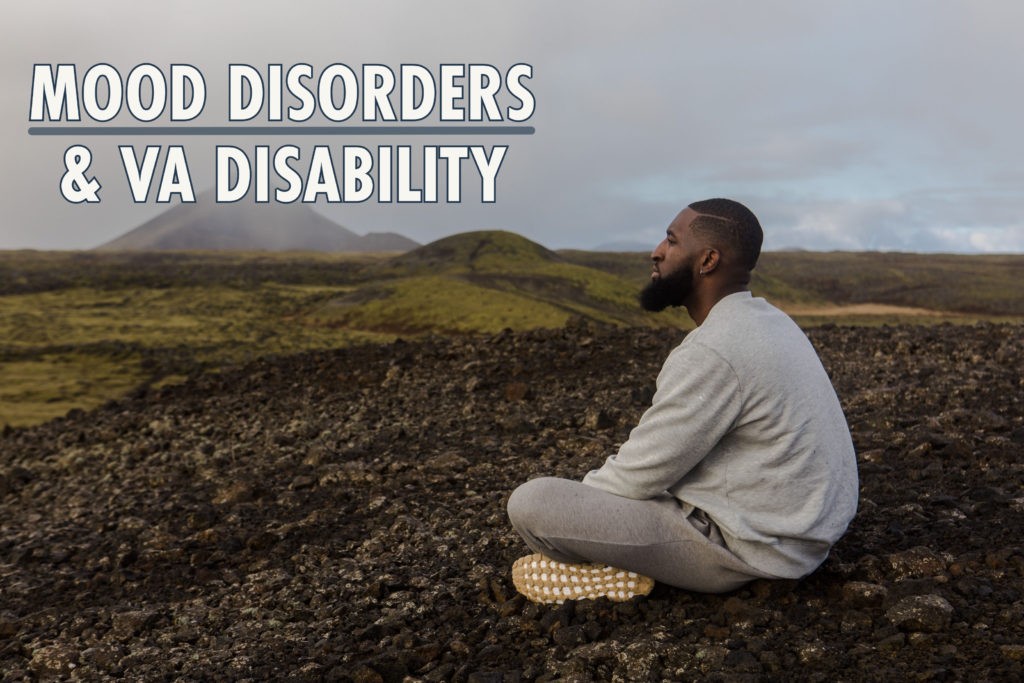 african american man sitting in broan grass against grey sky with text overlay Mood Disorders VA Disability Benefits