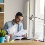 Man reading long-term definition of disability