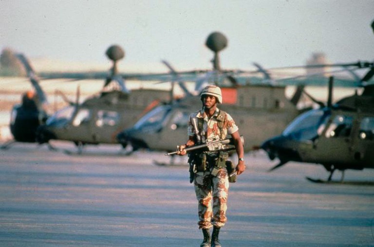 soldier in front of helicoptors with unexplained illness MUCMI