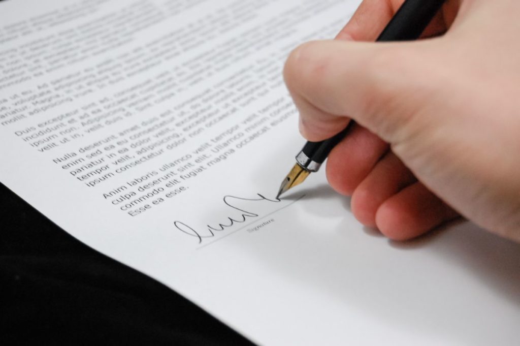 Person signing a document
