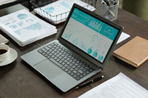 Laptop on a desk showing data that needs to be analyzed, representing AMA data.